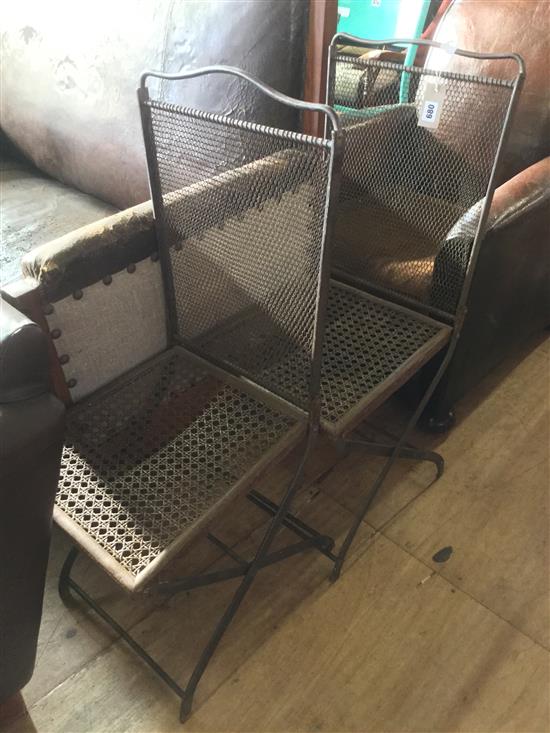 Pair of metal folding chairs